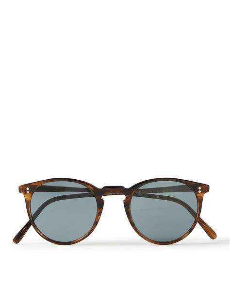 Round frame sunglasses in tortoiseshell acetate 